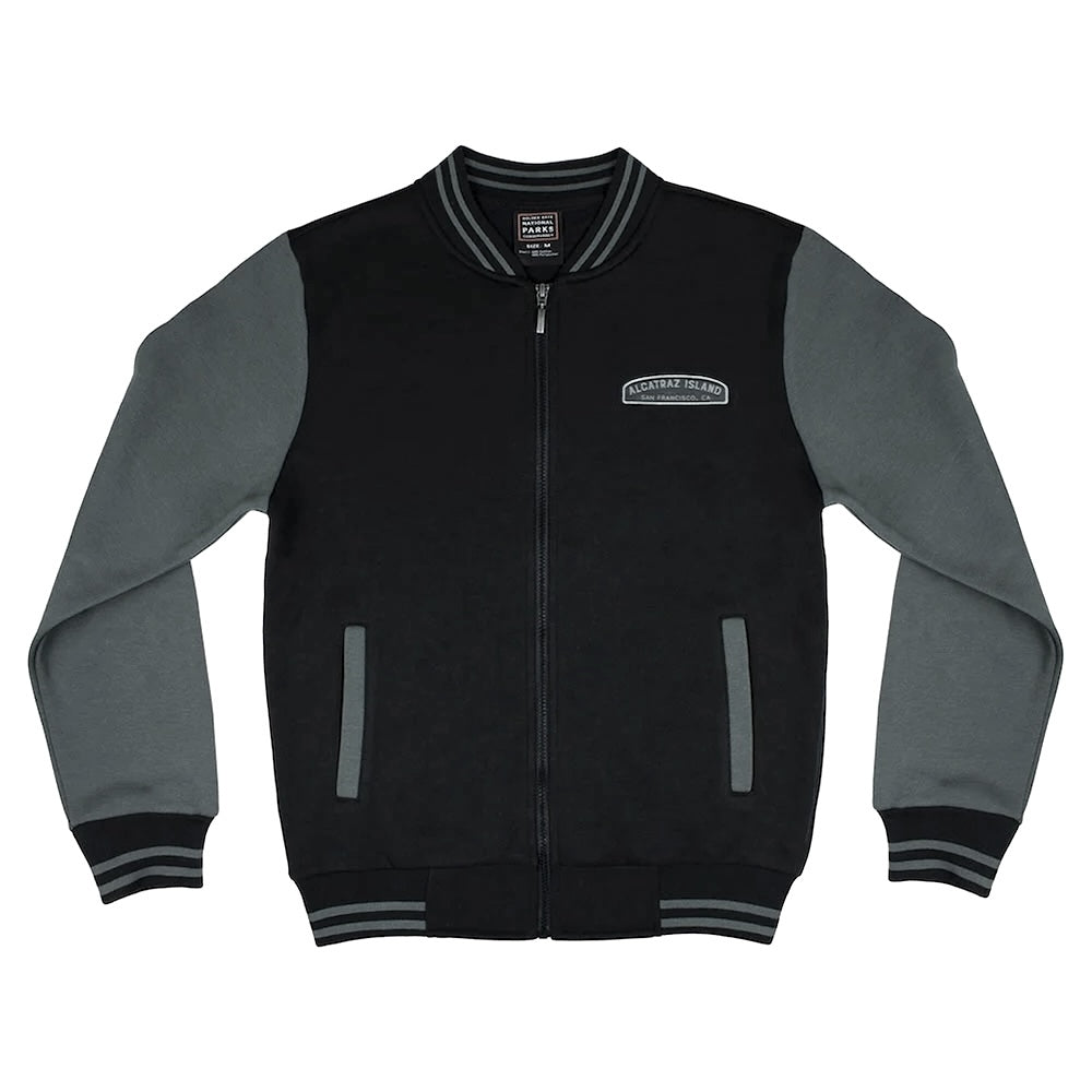 Black varsity style Alcatraz jacket with grey sleeves, by the Golden Gate National Parks Conservancy