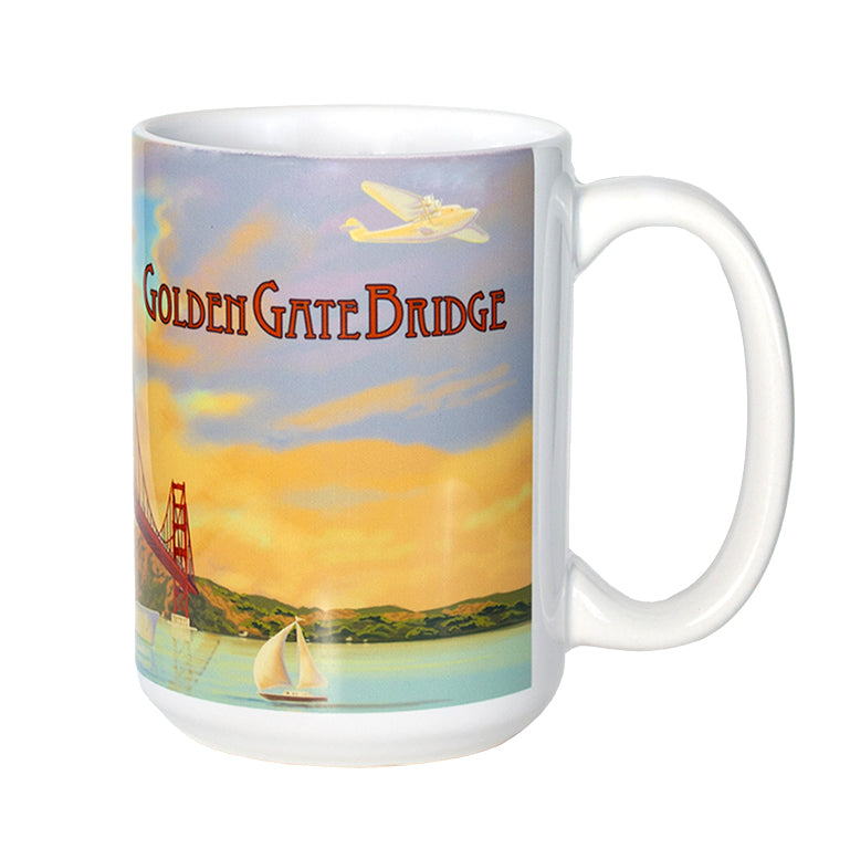 White ceramic 15-ounce mug featuring a colorful illustration of San Francisco's Golden Gate Bridge at sunset. The sky is lit with colorful orange clouds, while boats sail on the tranquil aqua blue waters of the bay.