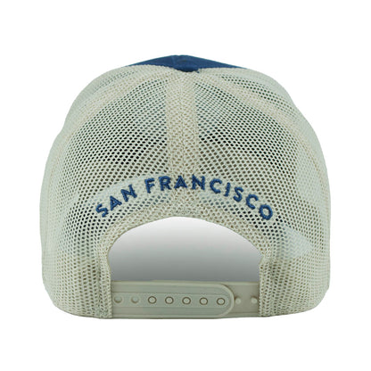 Back view of a blue and cream colored mesh trucker cap with 'San Francisco' text embroidered