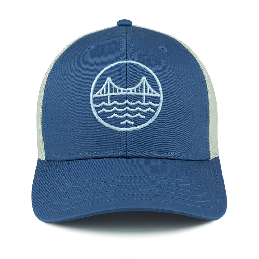 Blue and cream mesh trucker cap with a pale blue embroidered Golden Gate Bridge logo on the front panel