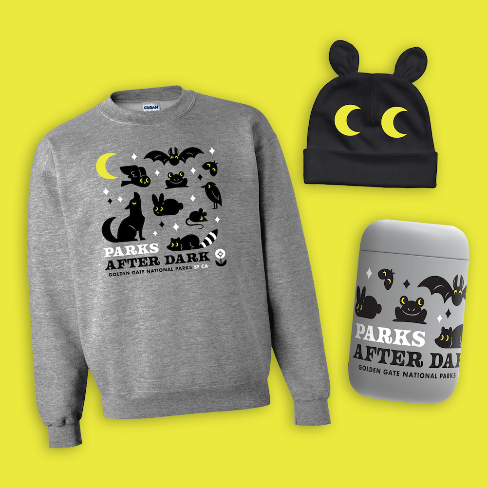 Products from Parks After Dark collection by the Golden Gate National Parks Conservancy, sweatshirt, thermos, and baby cap with cute illustrated nighttime animals.