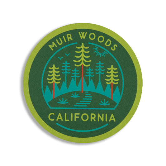 Circular coaster with 'Muir Woods California' text and forest design on a green background