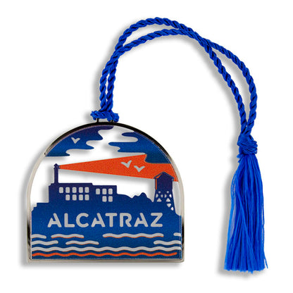 Metal Alcatraz Island ornament with colorful printed design, made by the Golden Gate National Parks Conservancy