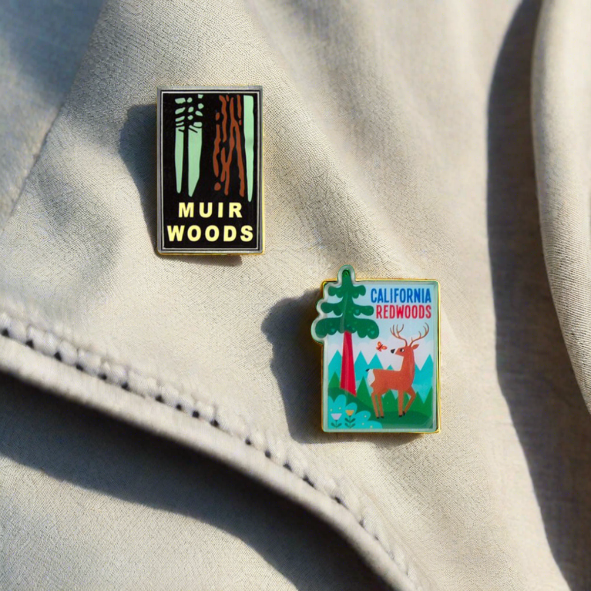 Muir Woods and California Redwoods decorative pins on lapel of denim jacket