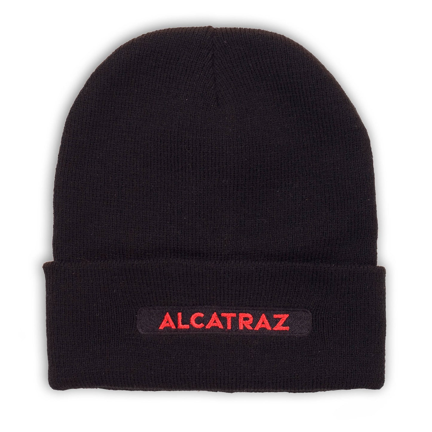 Black acrylic knit cap with "Alcatraz" text embroidered in bright red thread.