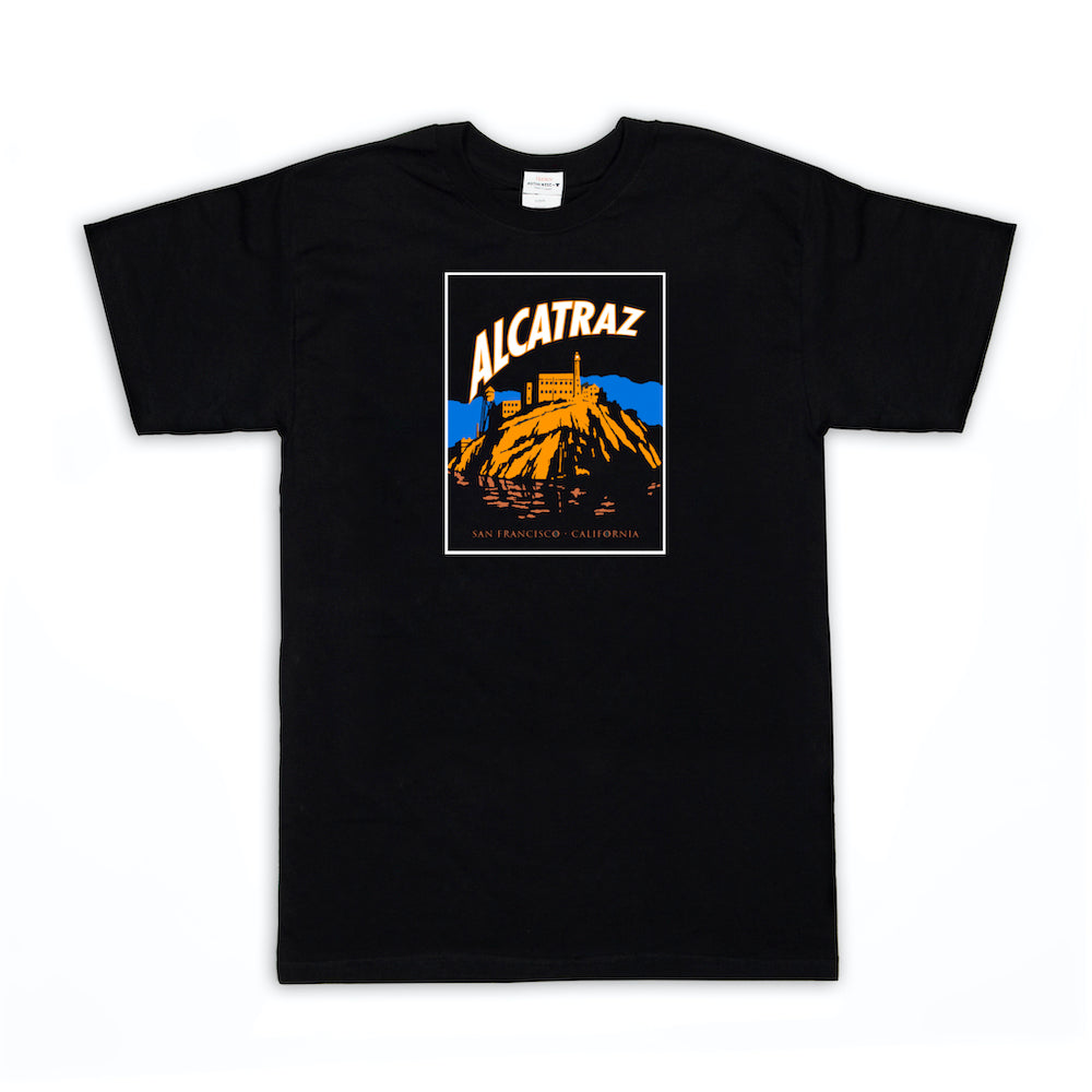 Black crew neck t-shirt with colorful screen-printed logo on chest, illustration of Alcatraz Island at night with words "Alcatraz San Francisco California" in white and tan.