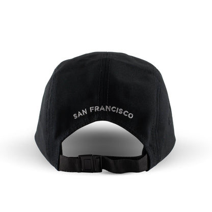 Back view of black baseball cap with San Francisco in capital letters embroidered in silver above adjustable closure.