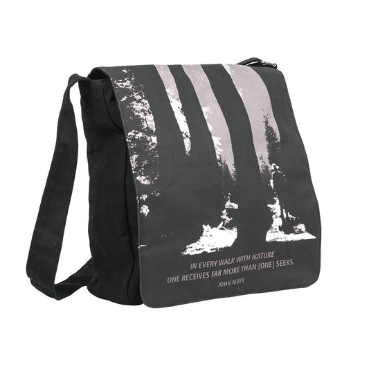 Black messenger bag with black-and-white photograph of Muir Woods printed on front flap.