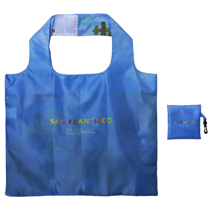 Colorful reusable tote bag with rainbow-colored words "San Francisco California" on blue background and snap-closure pouch with hook.