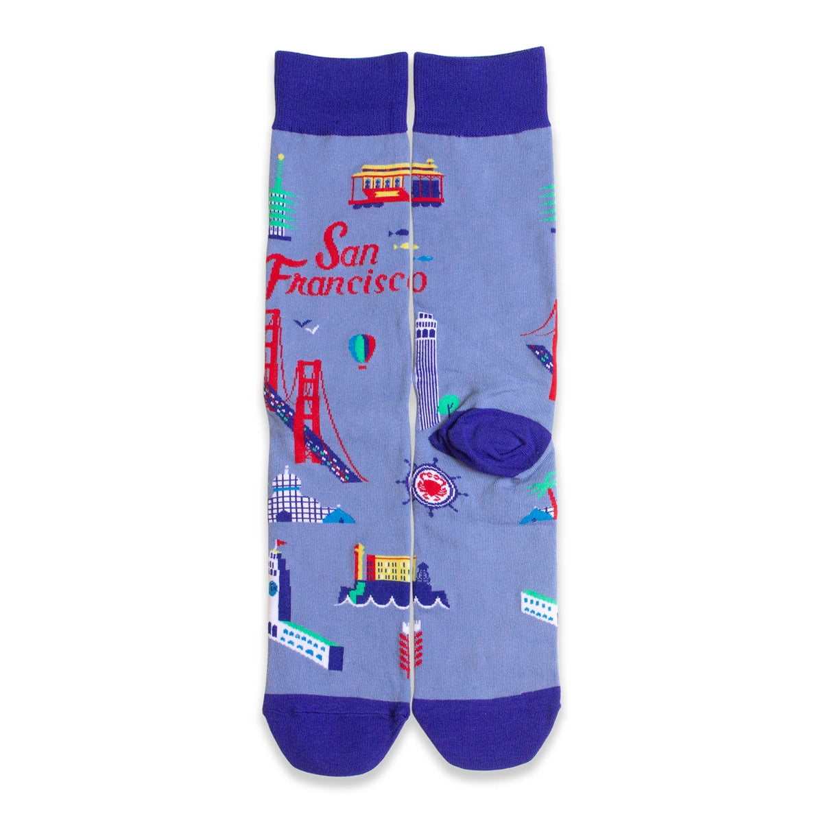 Blue novelty socks with multicolored designs of San Francisco landmarks, including the Golden Gate Bridge and Alcatraz Island.