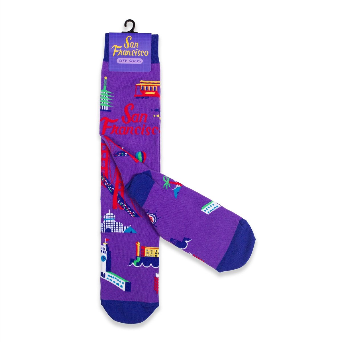 Purple novelty socks with multicolored designs of San Francisco landmarks, including Golden Gate Bridge and Alcatraz Island.