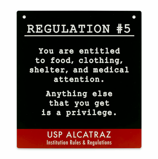 Black decorative metal square sign with Alcatraz Regulation 5 ("You are entitled to food, clothing...") printed in white. Red accent.