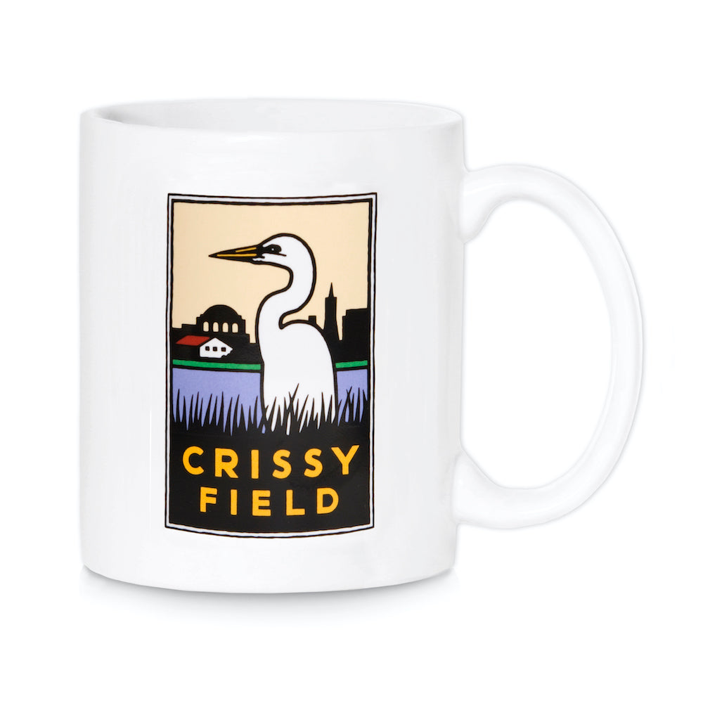 White Crissy Field mug featuring art by San Francisco Bay Area designer Michael Schwab, colorful illustration of bird in front of marsh and Palace of Fine Arts.