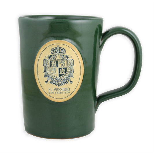 Forest green handmade mug with El Presidio San Francisco text and crest stamped at center.