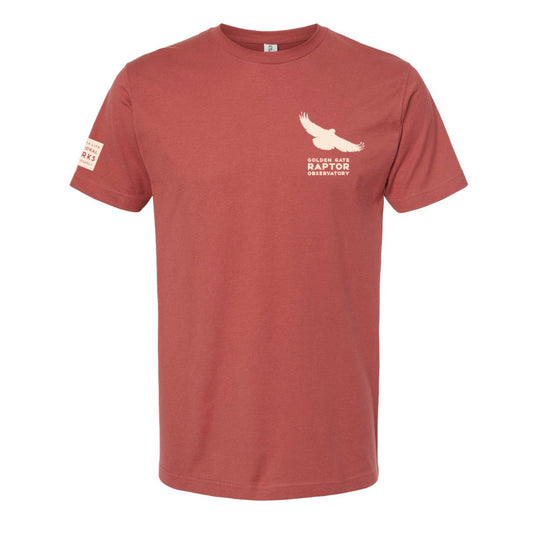 Golden Gate Raptor Observatory t-shirt, orange with pale orange cream printed raptor logo on left breast and sleeve.