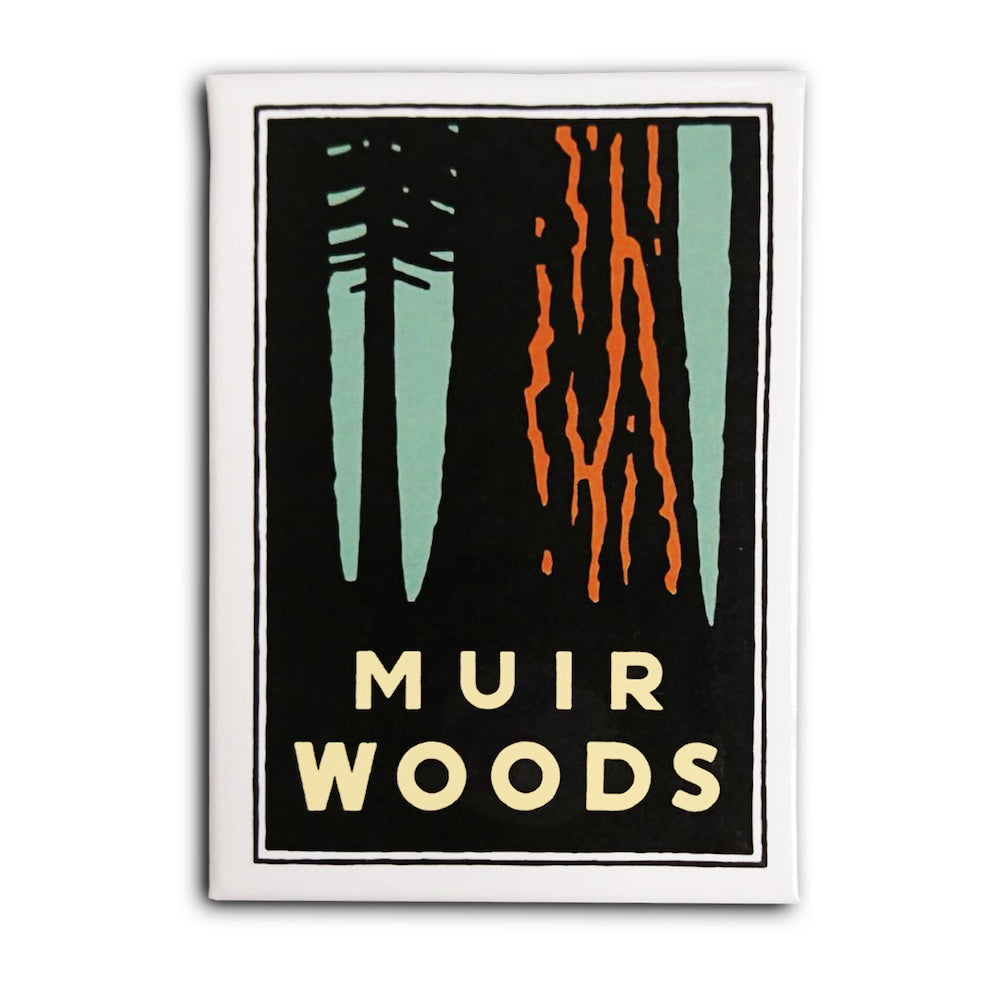 Rectangular white magnet with colorful green, brown, and black illustration of redwood trees with yellow “Muir Woods” text. Art by Michael Schwab.
