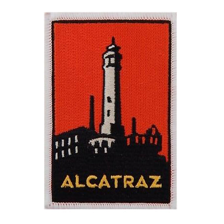 Multicolor orange and black embroidered patch featuring Alcatraz lighthouse design, based on artwork by Michael Schwab.