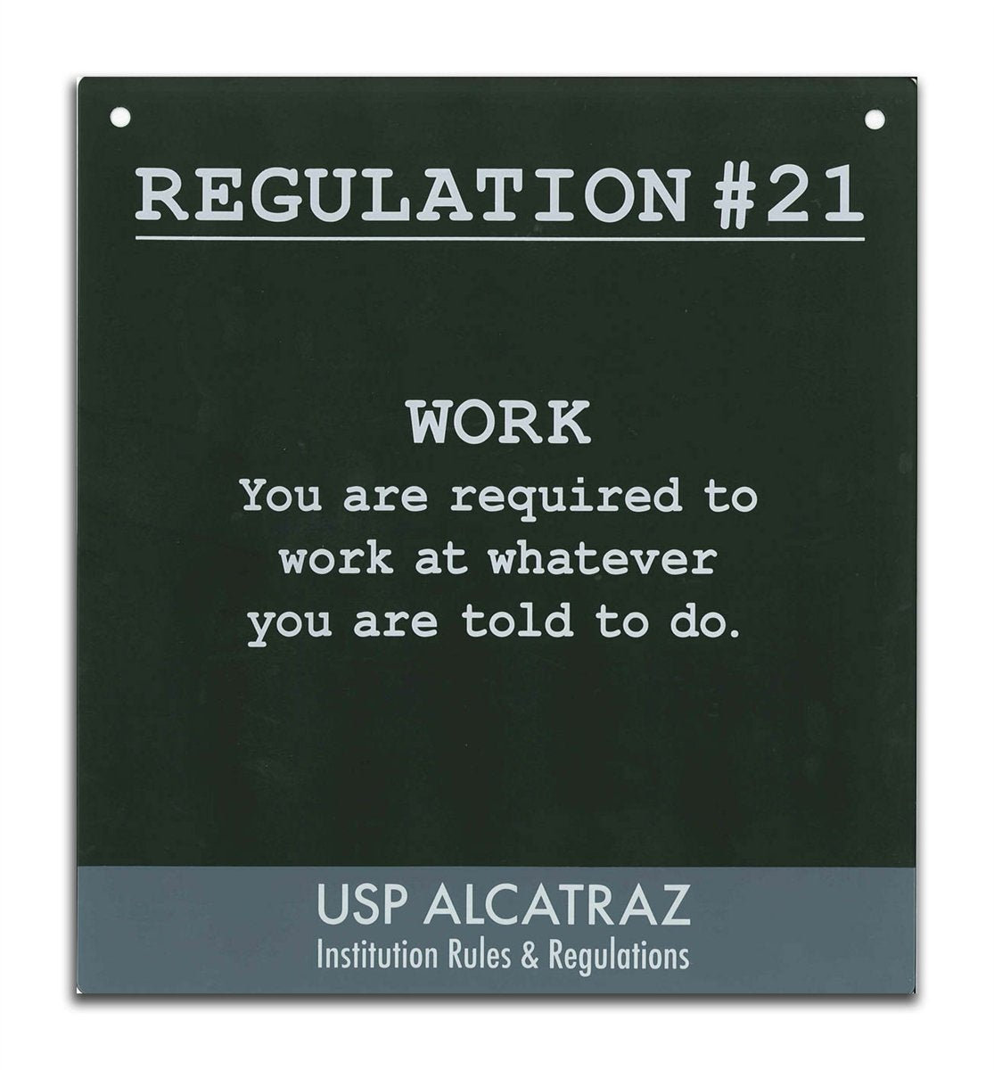 Black and grey decorative metal sign with Alcatraz Regulation 21 ("You are required to work...") printed in white.