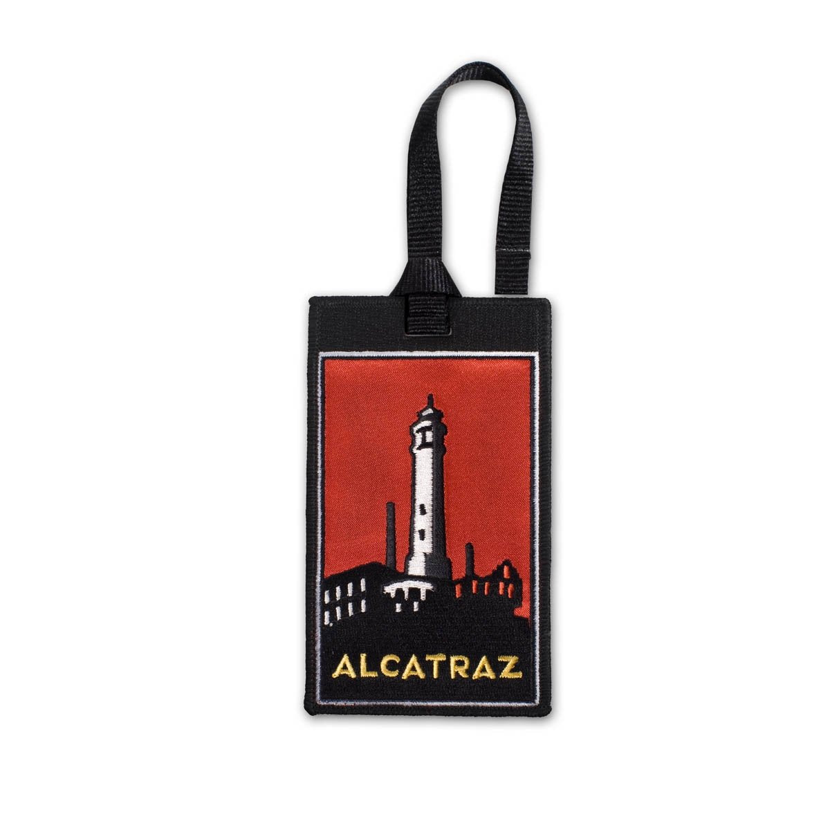 Multicolor embroidered luggage tag with design of Alcatraz lighthouse, based on artwork by Michael Schwab.