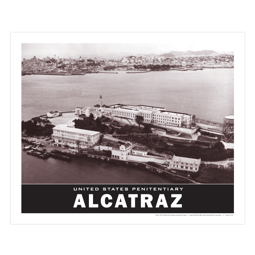 United States Penitentiary Alcatraz poster by the Golden Gate National Parks Conservancy, featuring a 1950s black and white aerial photograph of the island, with San Francisco in the background.