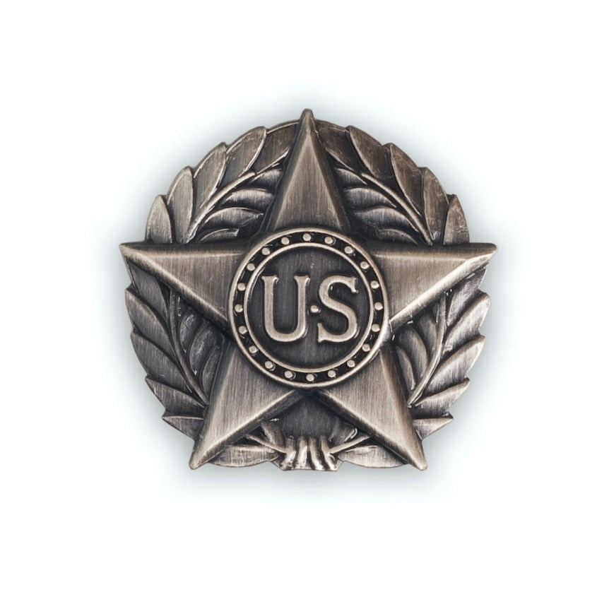 Replica World War I Victory Button, based on an original artifact in the Golden Gate National Recreation Area Museum Collection. Letters "US" superimposed on top of a 5 pointed start at the center of a wreath.