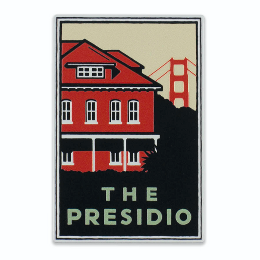 Rectangular magnet with colorful design, red and white illustration of the Presidio of San Francisco buildings and Golden Gate Bridge with “The Presidio” text in green. Art by Michael Schwab.