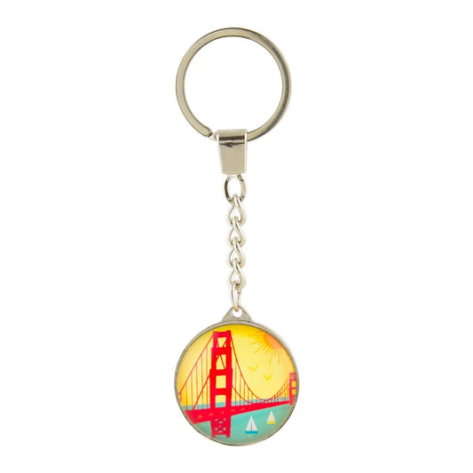 Crystal keychain with colorful vintage-inspired illustration depicting the Golden Gate Bridge, sailboats, and sunshine.