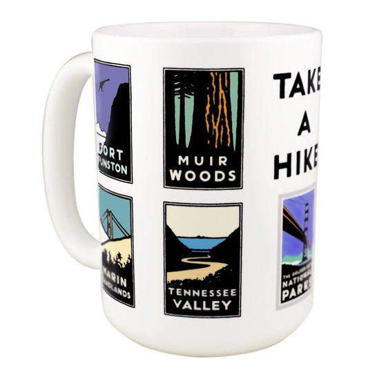 15 oz. white mug with nine colorful Golden Gate National Park icons and "Take a Hike" slogan. Artwork by Michael Schwab.